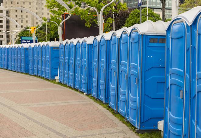 a row of portable restrooms ready for eventgoers in Beavercreek